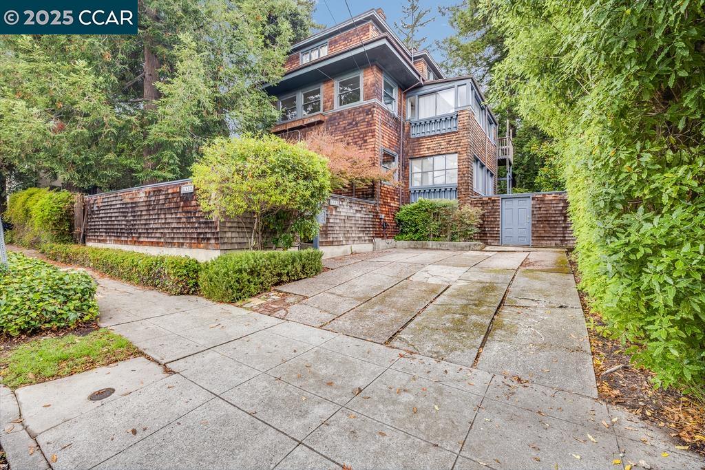 2519 Etna Street, Unit 1 Berkeley, CA 94704 - Photo 1 of 1 a front view of a house with a yard and a garden