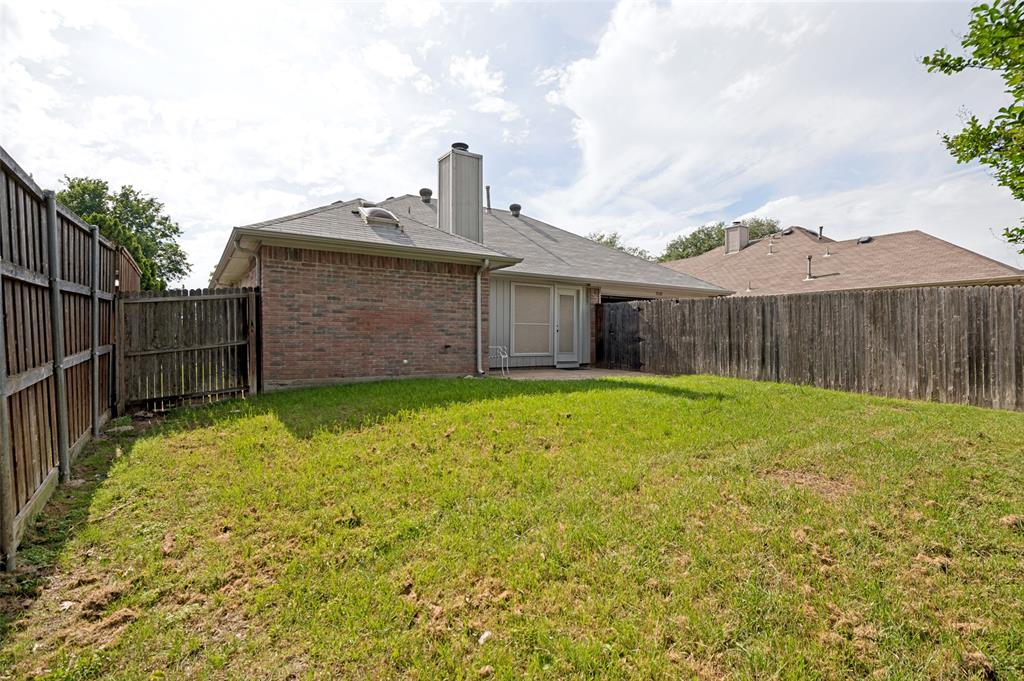 8160 Tower Road Frisco, TX 75035 - Photo 23 of 25 a front view of a house with garden
