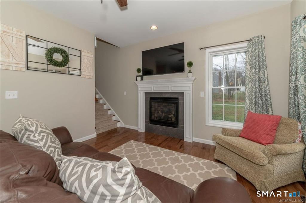823 A Stone Road Windsor, CT 06095 - Photo 19 of 38 Family room Asher