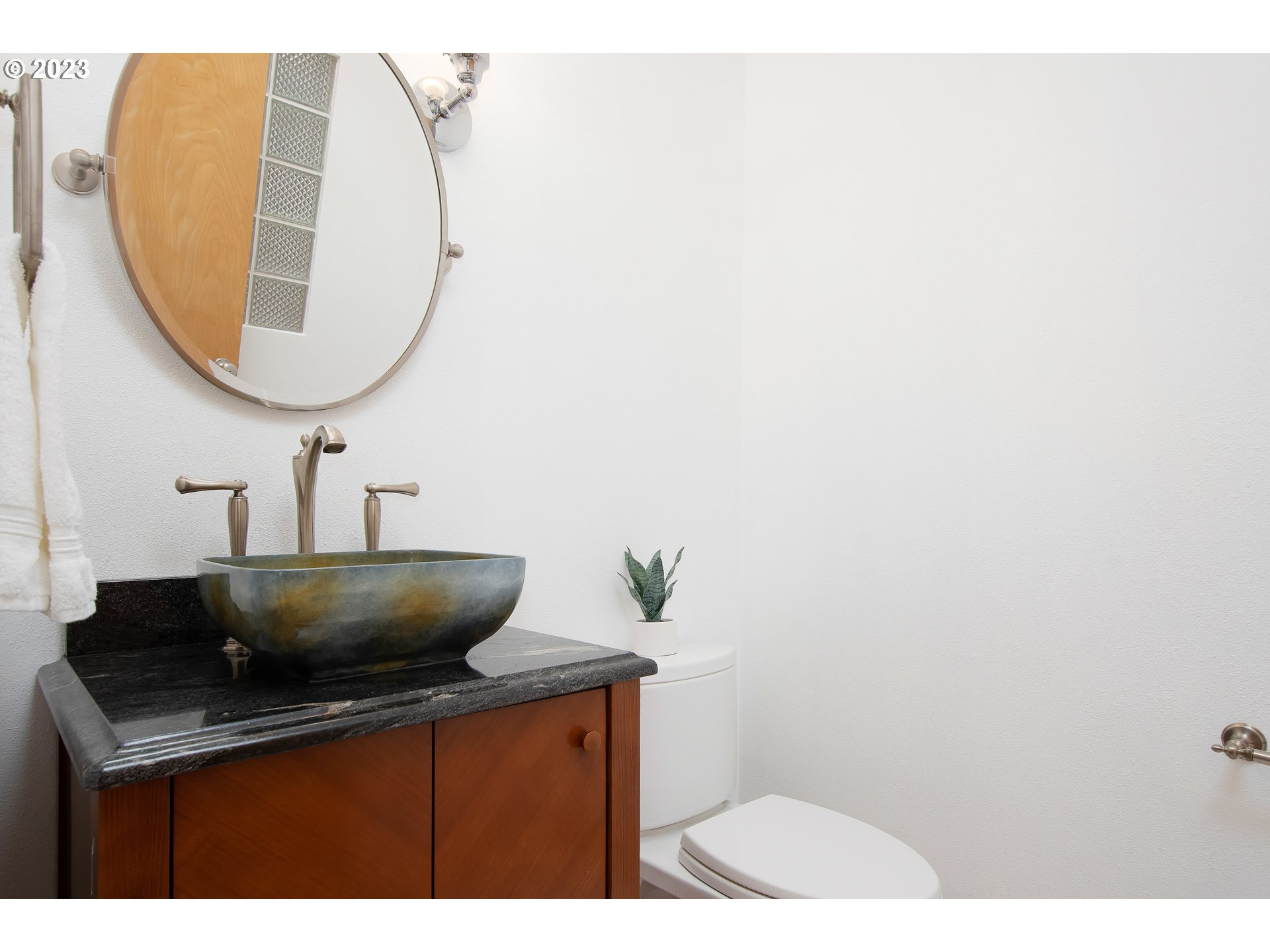 8208 Northwest Reed Drive Portland, OR 97229 - Photo 17 of 39 a bathroom with a sink and a mirror