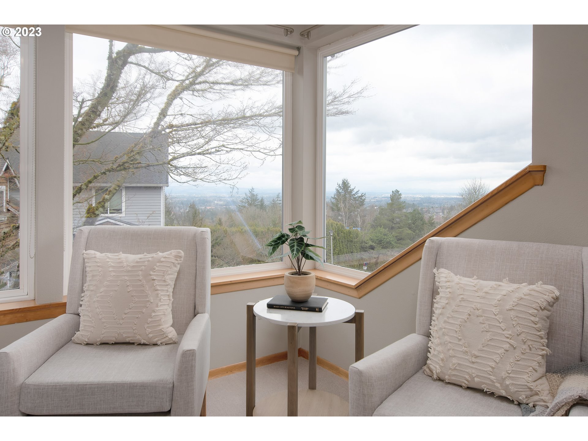 8208 Northwest Reed Drive Portland, OR 97229 - Photo 19 of 39 a balcony with furniture and a large window
