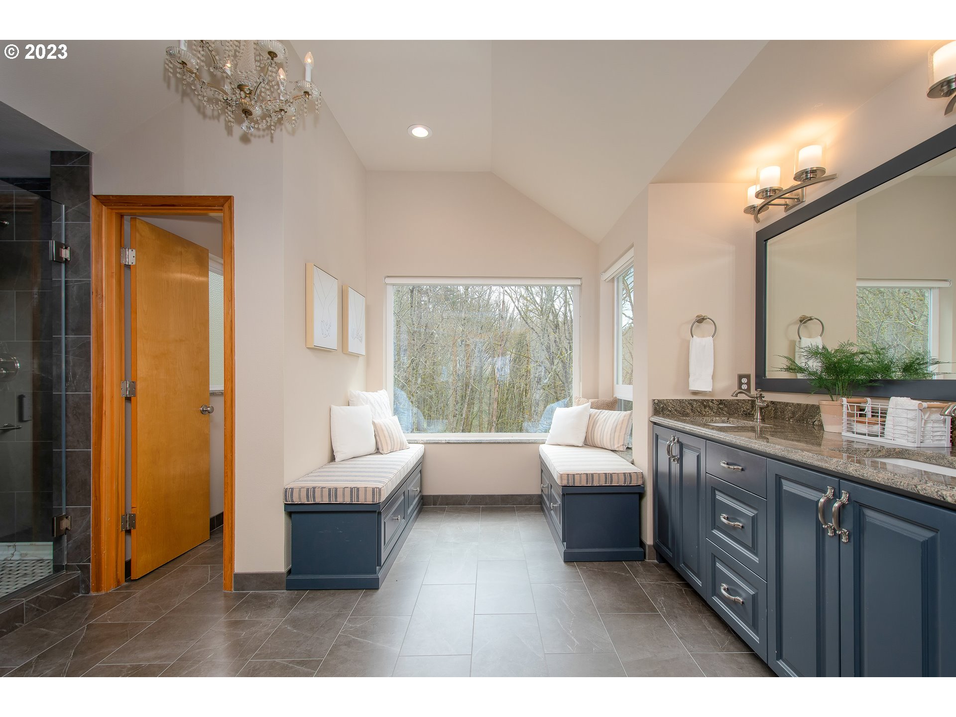 8208 Northwest Reed Drive Portland, OR 97229 - Photo 20 of 39 a living room with furniture and a large window