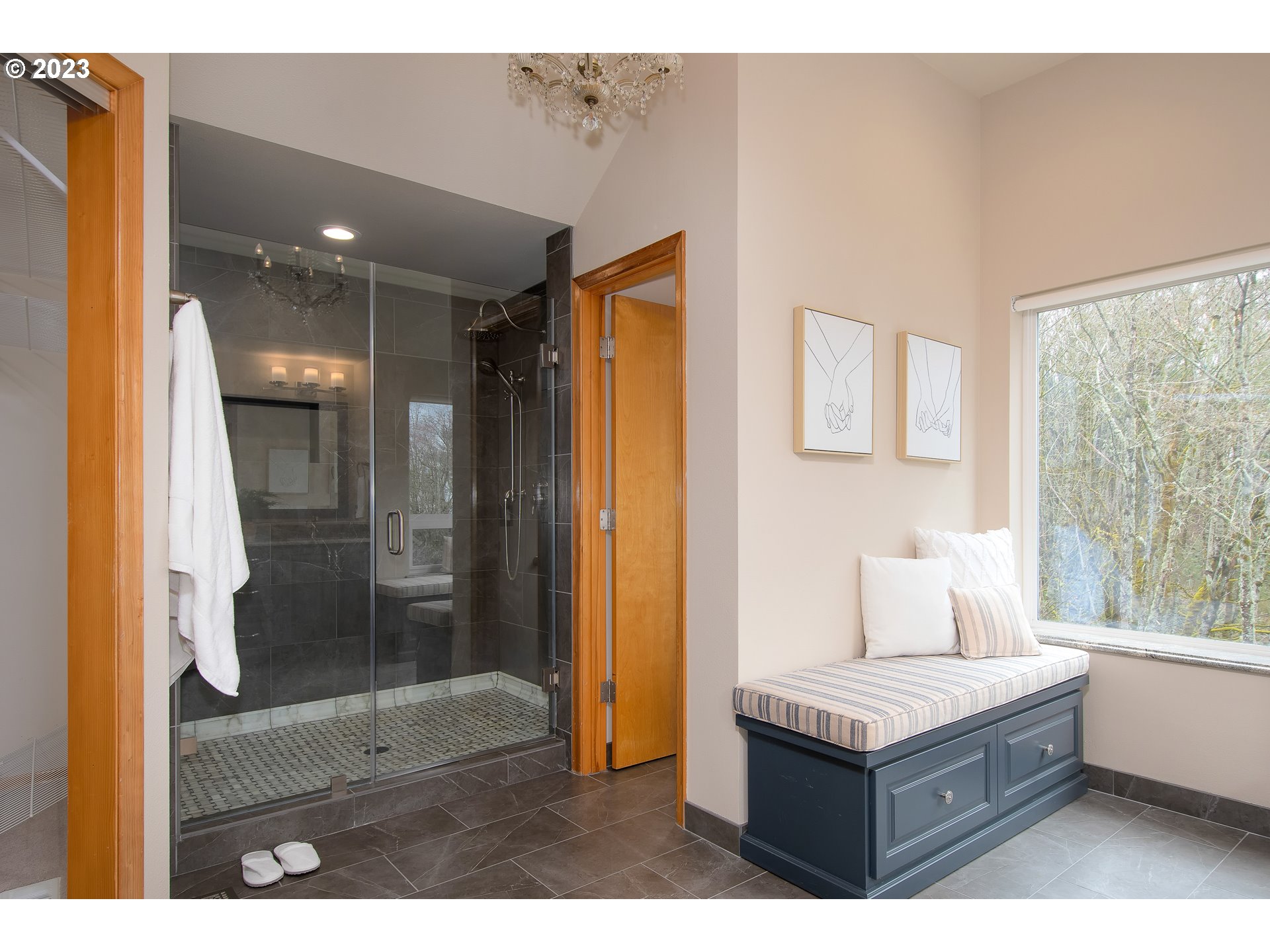 8208 Northwest Reed Drive Portland, OR 97229 - Photo 22 of 39 a living room with furniture and a glass door