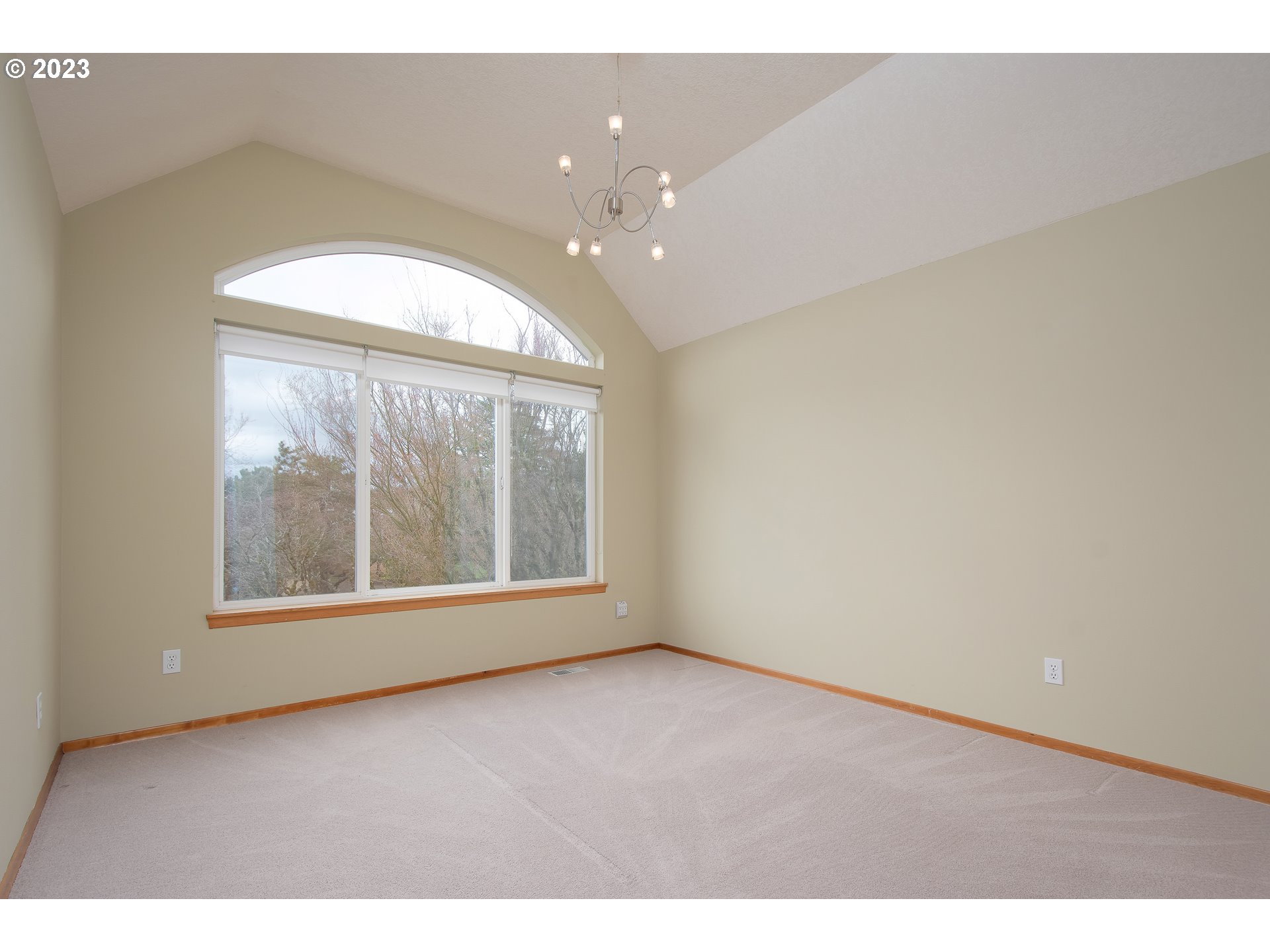 8208 Northwest Reed Drive Portland, OR 97229 - Photo 28 of 39 an empty room with a empty space and windows