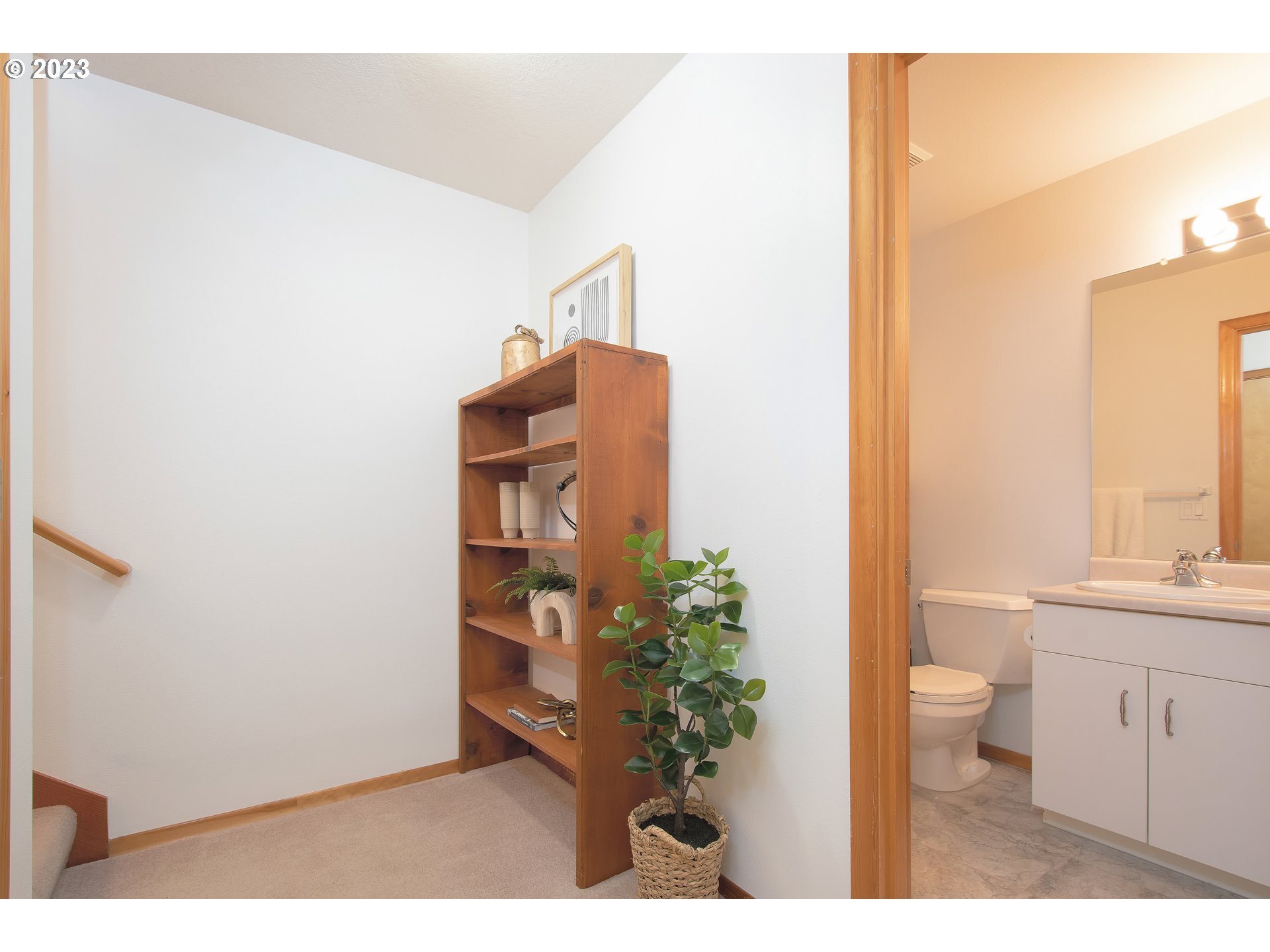 8208 Northwest Reed Drive Portland, OR 97229 - Photo 29 of 39 a bathroom with a toilet and a sink