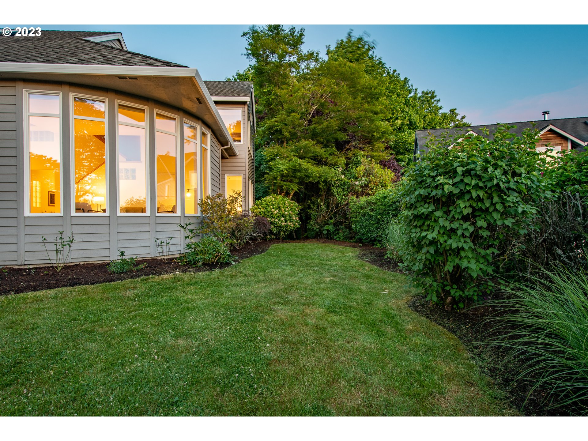 8208 Northwest Reed Drive Portland, OR 97229 - Photo 37 of 39 a view of a house with a backyard