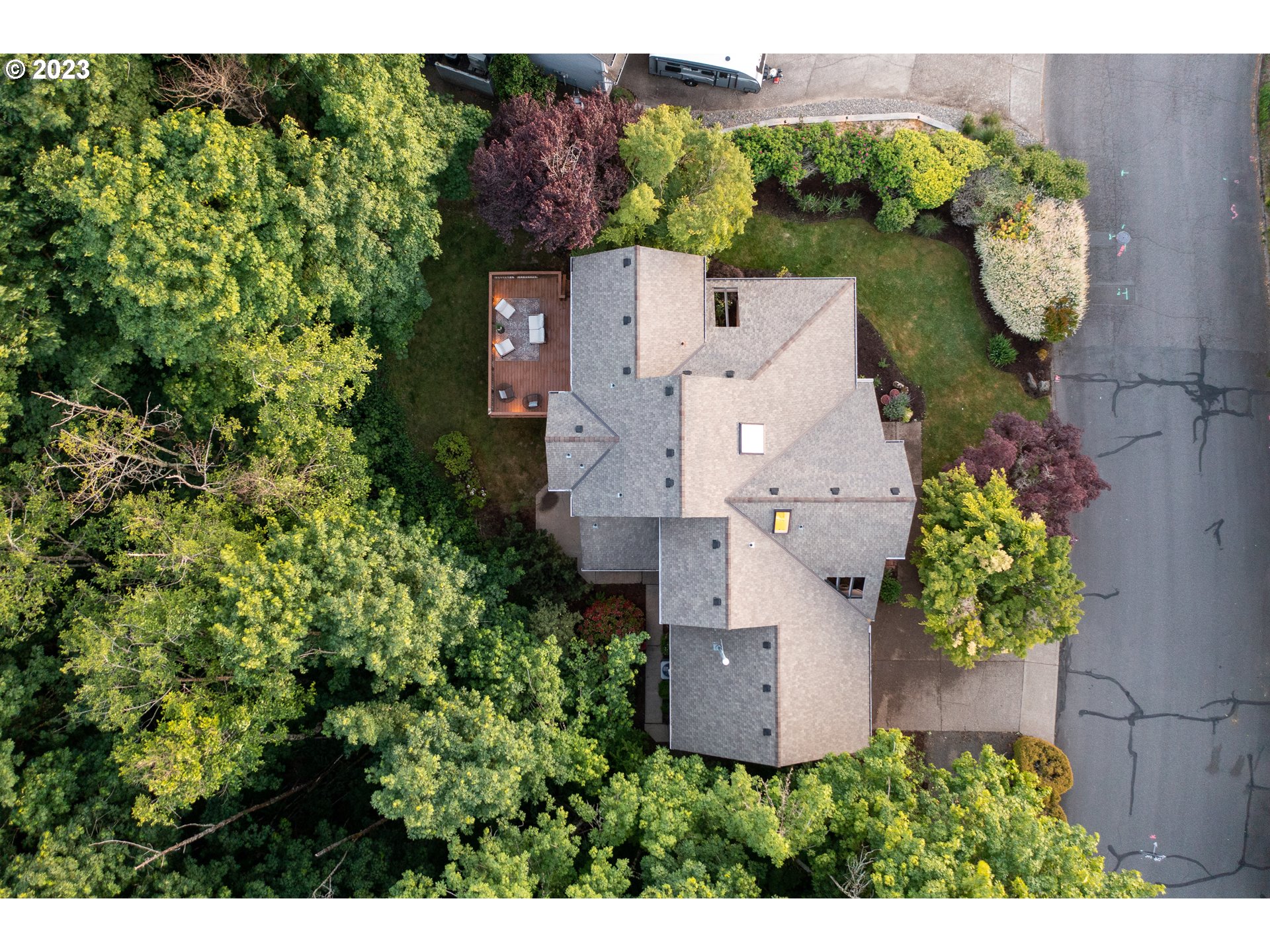 8208 Northwest Reed Drive Portland, OR 97229 - Photo 38 of 39 an aerial view of a house with a yard and garden