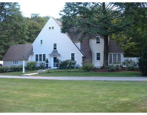 222 Boston Post Road Weston, MA 02493 - Photo 1 of 12 a front view of a house with a yard