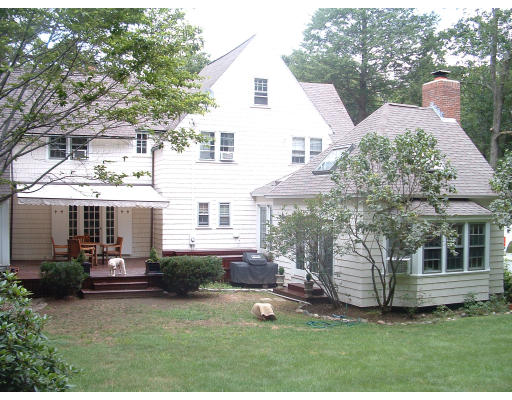 222 Boston Post Road Weston, MA 02493 - Photo 2 of 12 a view of a house with backyard and garden