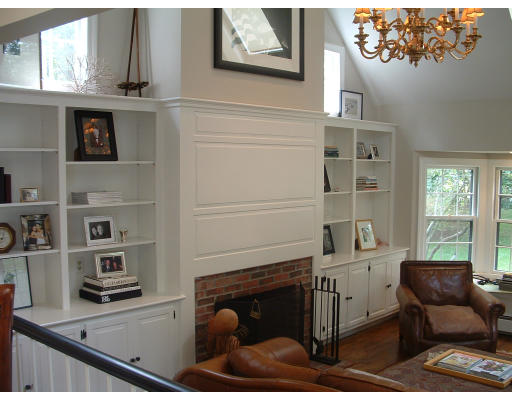 222 Boston Post Road Weston, MA 02493 - Photo 9 of 12 a living room with furniture a window and bookshelf