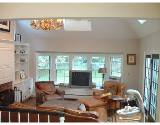 222 Boston Post Road Weston, MA 02493 - Photo 10 of 12 a living room with furniture and a flat screen tv