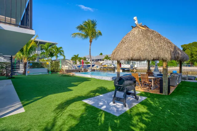 a view of outdoor space yard deck patio and outdoor kitchen