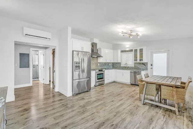 a view of kitchen with wooden floor