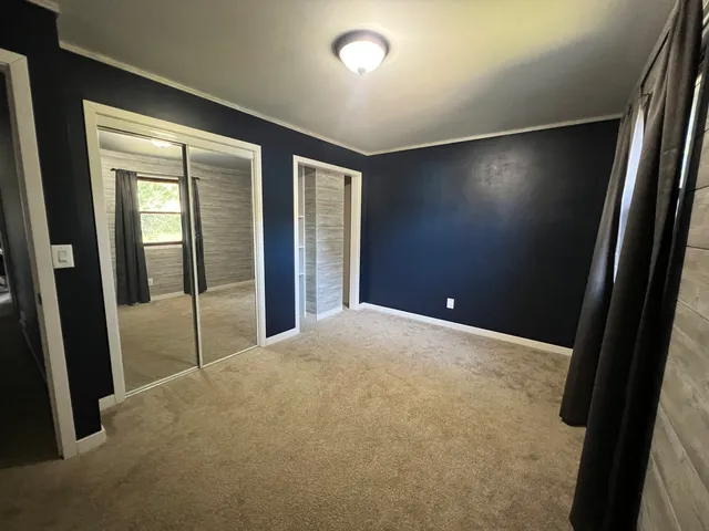a view of a livingroom with a window