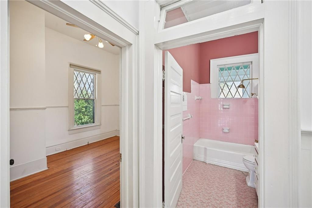 2140 North Broad Street Commerce, GA 30529 - Photo 19 of 33 a hallway with front door wooden floor and closet