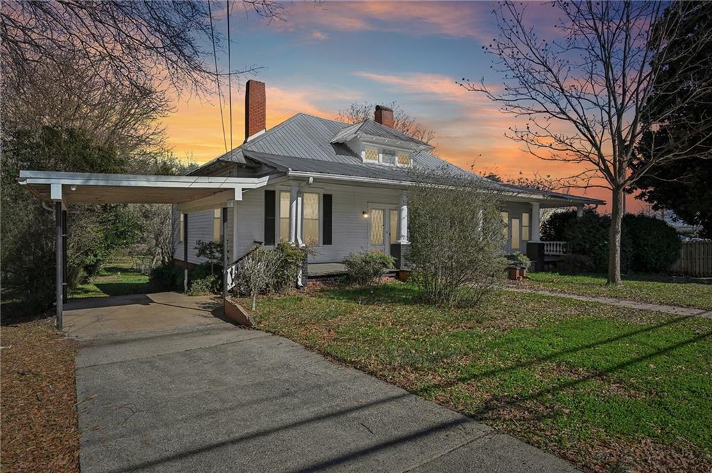 2140 North Broad Street Commerce, GA 30529 - Photo 2 of 33 a front view of a house with yard patio and green space