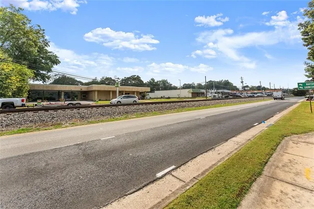 a view of a city street with a building
