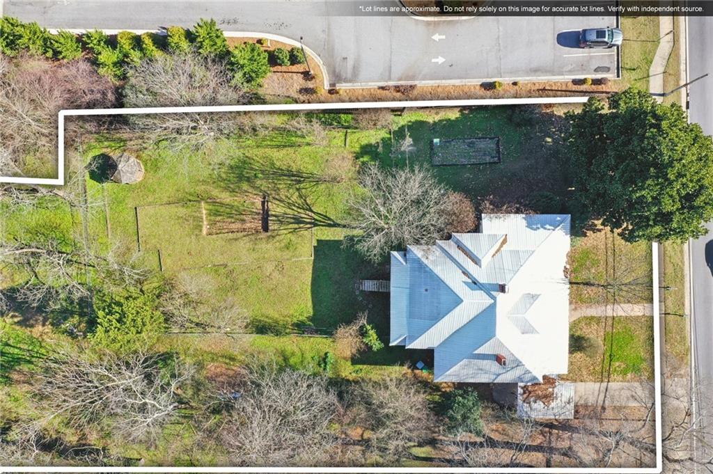 2140 North Broad Street Commerce, GA 30529 - Photo 29 of 33 a view of a swimming pool with a yard