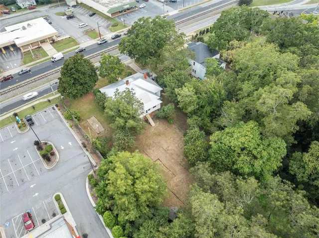 an aerial view of residential house with outdoor space