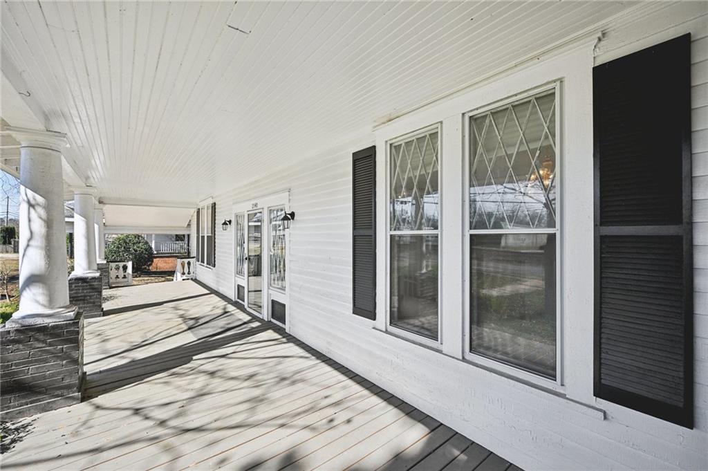 2140 North Broad Street Commerce, GA 30529 - Photo 5 of 33 a view of a living room and bathroom