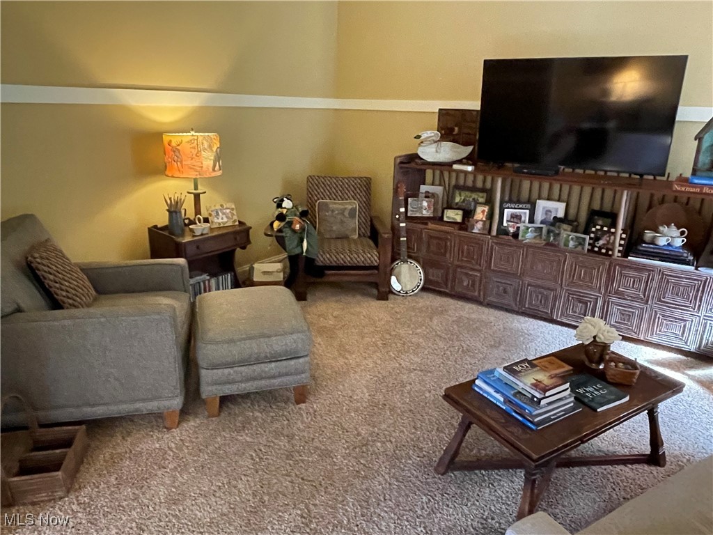 8322 Forest Ridge Street Northwest Massillon, OH 44646 - Photo 23 of 33 View of carpeted living room