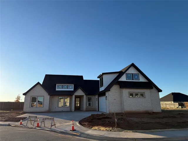 a front view of a house with entertaining space