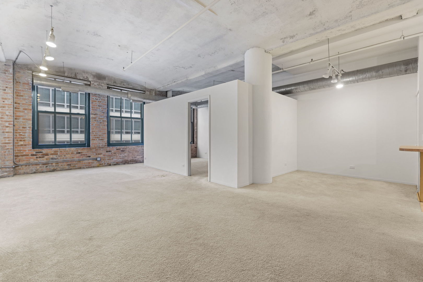 801 South Wells Street, Unit 808 Chicago, IL 60607 - Photo 4 of 15 a view of an empty room with a window