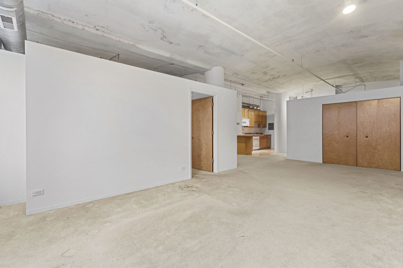 801 South Wells Street, Unit 808 Chicago, IL 60607 - Photo 7 of 15 a view of empty room with wooden floor