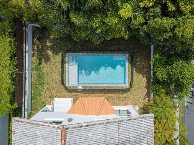 a bathroom with a sink vanity and a toilet