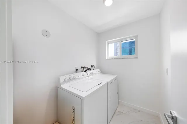 a view of kitchen with wooden floor