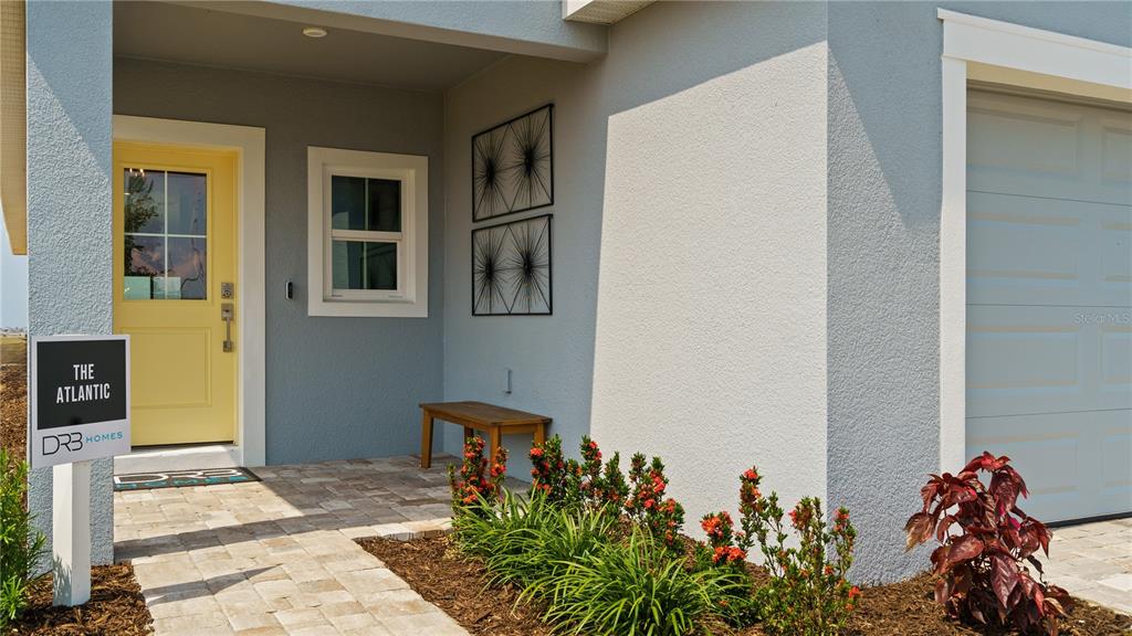 1353 June Lake Loop Haines City, FL 33844 - Photo 6 of 44 a front view of a house with a yard