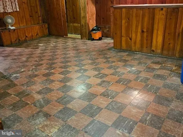 a view of outdoor space with wooden floor