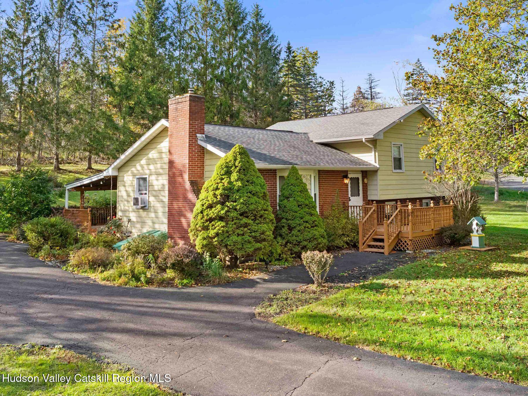 1339 Cornwallville Road Cornwallville, NY 12418 - Photo 1 of 47 front view of a house with a small yard