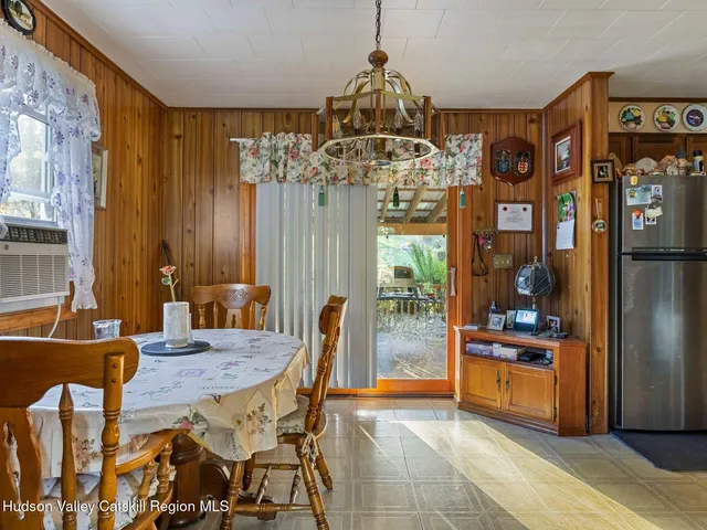 a kitchen with stainless steel appliances granite countertop a stove and a refrigerator