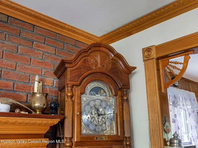 a living room with furniture fireplace and flat screen tv