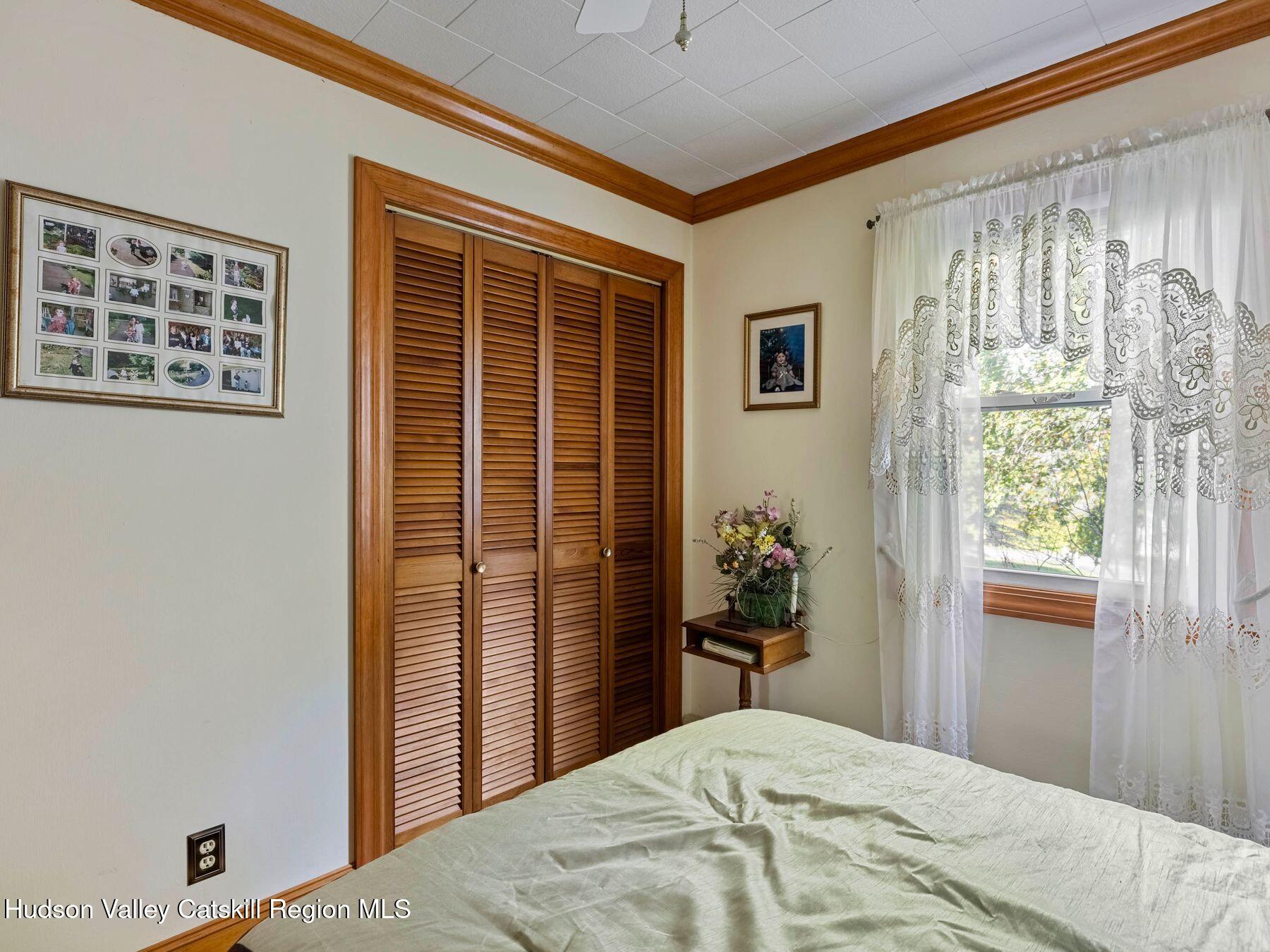 1339 Cornwallville Road Cornwallville, NY 12418 - Photo 33 of 47 a bedroom with a bed and a window