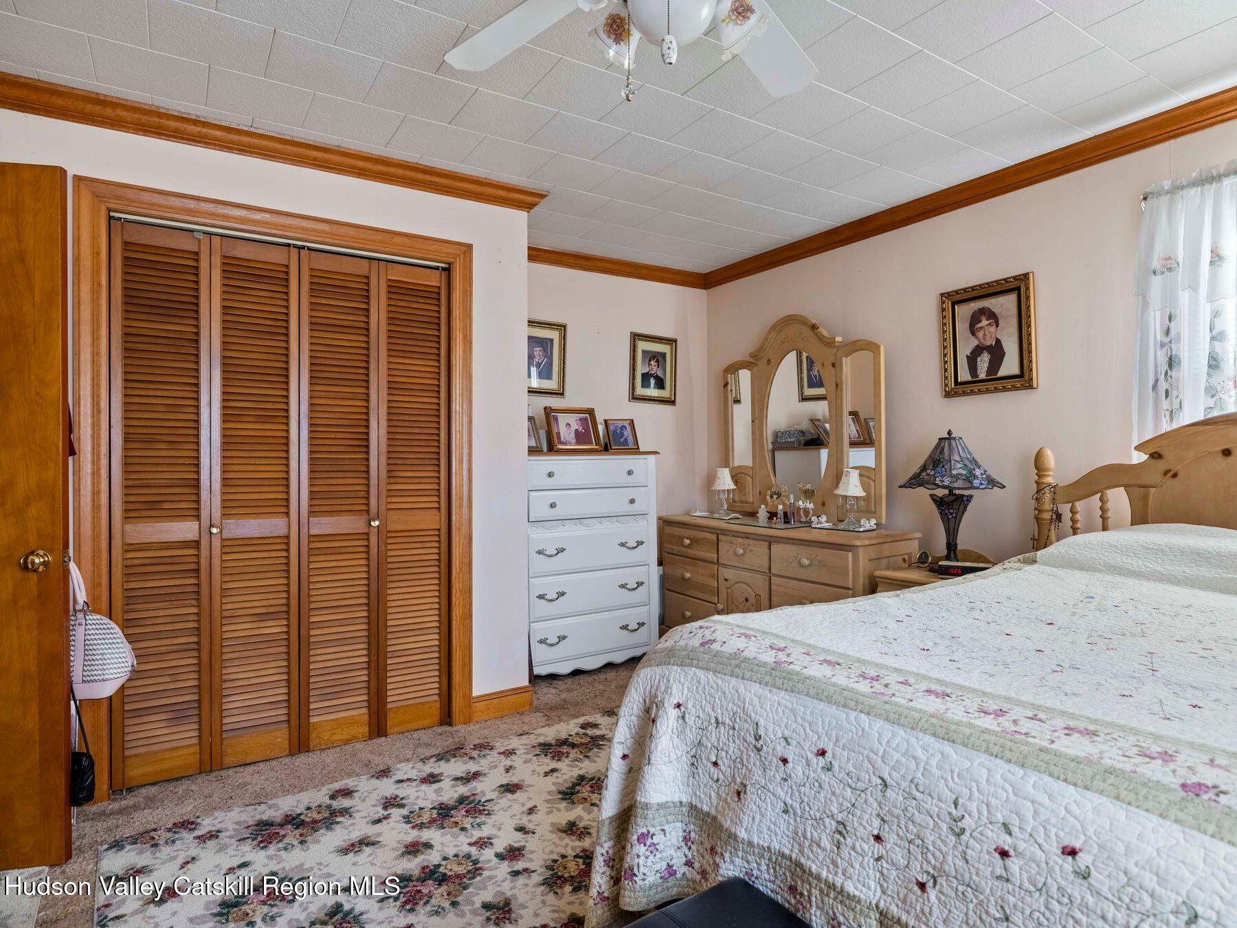 1339 Cornwallville Road Cornwallville, NY 12418 - Photo 35 of 47 a bedroom with a bed and a dresser