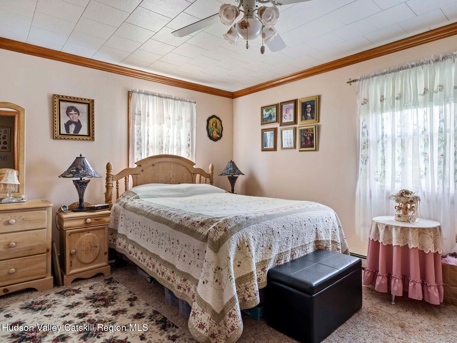 1339 Cornwallville Road Cornwallville, NY 12418 - Photo 36 of 47 a bedroom with a bed and wooden floor