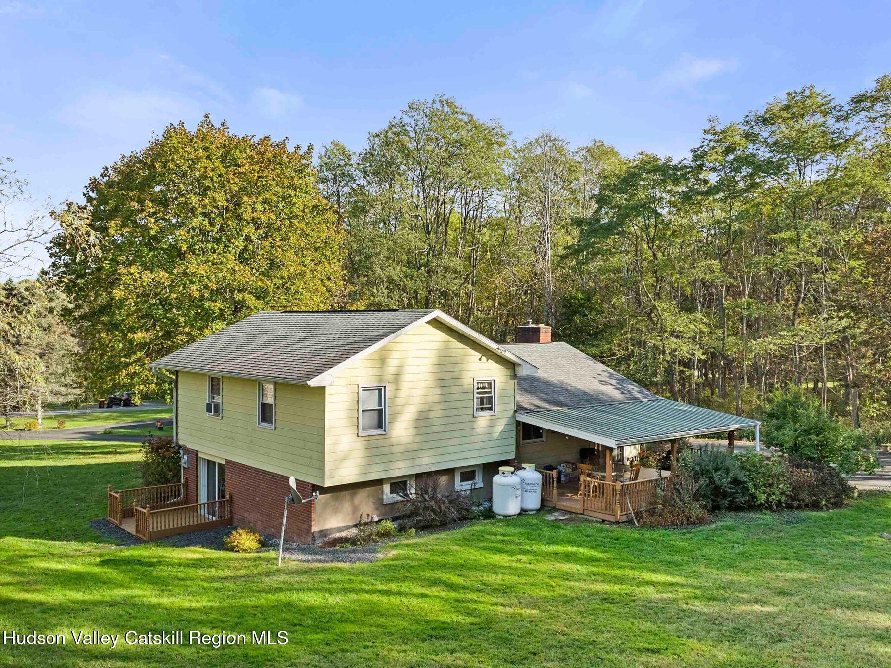 1339 Cornwallville Road Cornwallville, NY 12418 - Photo 44 of 47 a view of a house with a yard balcony and sitting area