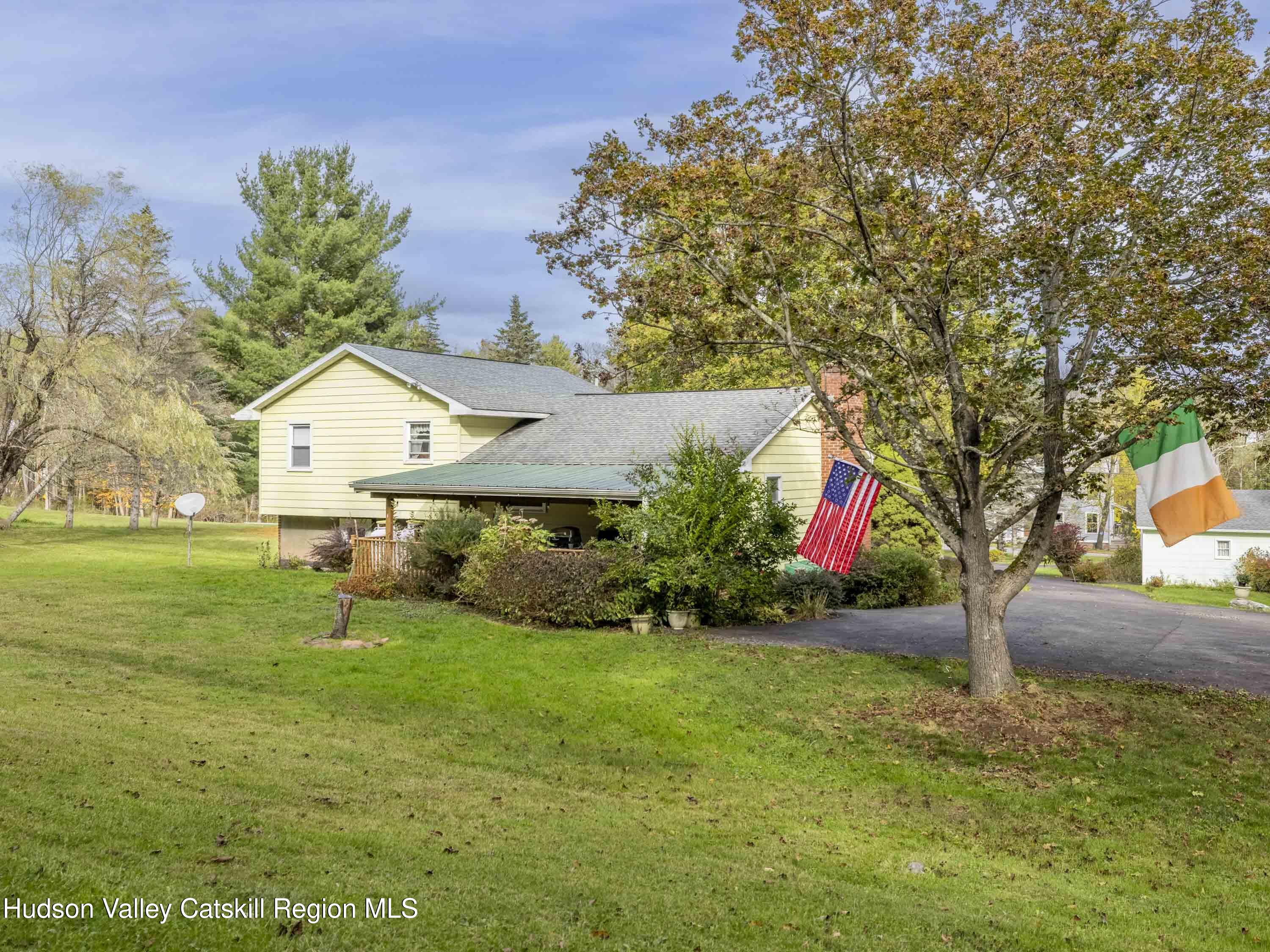 1339 Cornwallville Road Cornwallville, NY 12418 - Photo 6 of 47 a view of an house with backyard space and garden