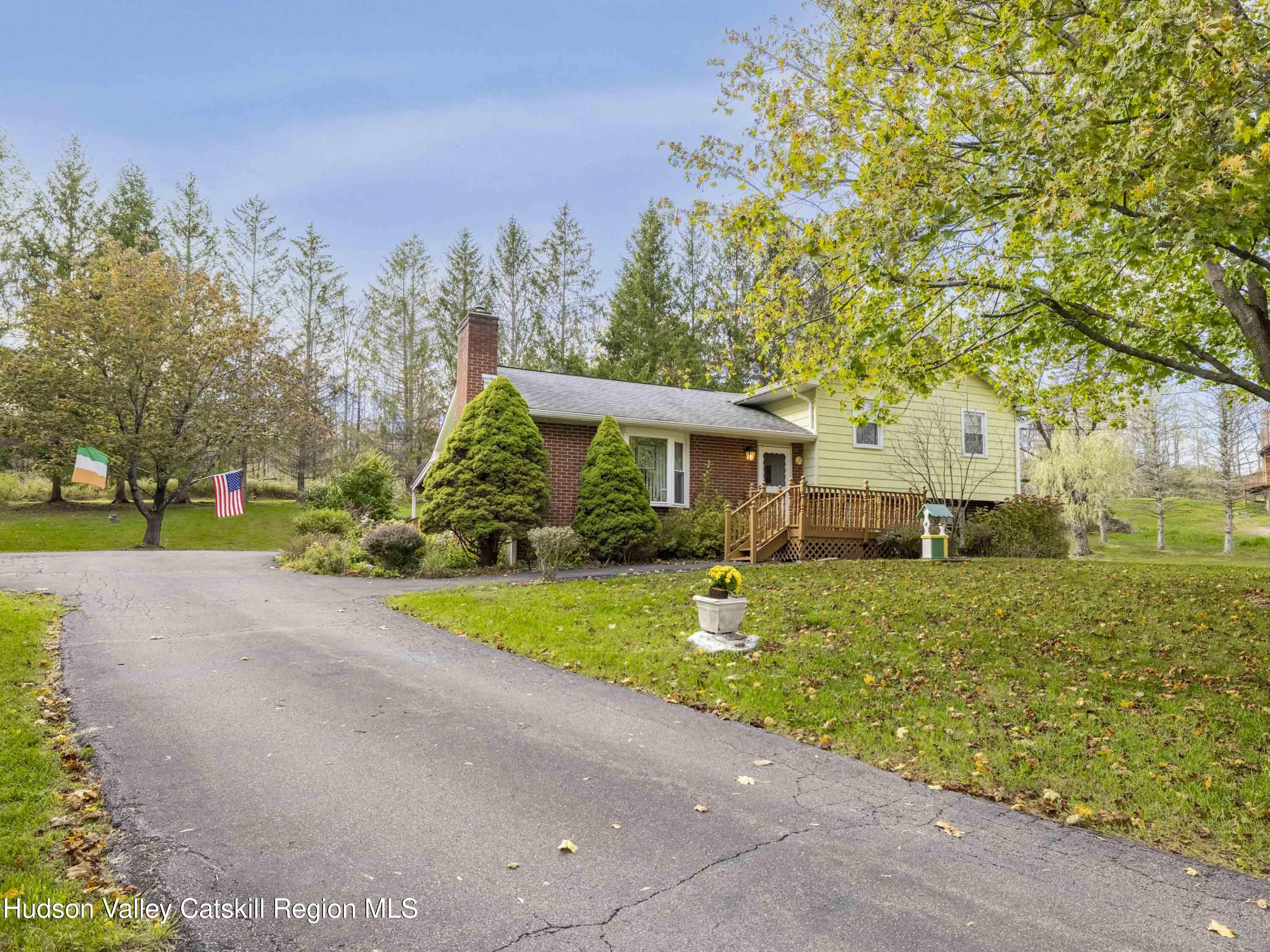 1339 Cornwallville Road Cornwallville, NY 12418 - Photo 10 of 47 a front view of a house with a yard and trees