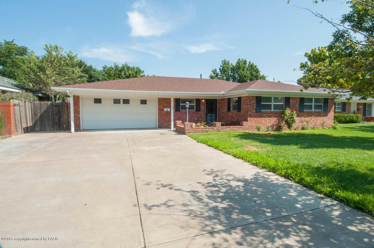 6016 Gainsborough Road Amarillo, TX 79106 - Photo 1 of 36 a view of a house with a yard and potted plants