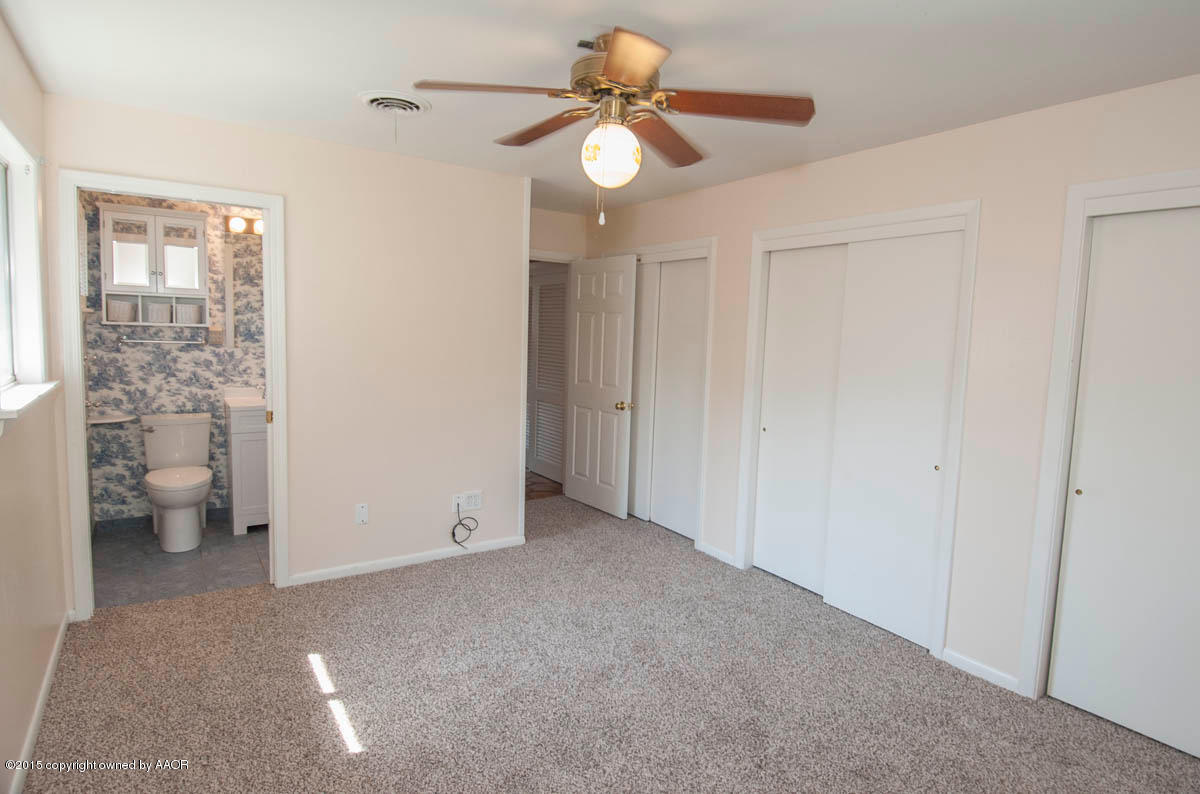 6016 Gainsborough Road Amarillo, TX 79106 - Photo 16 of 36 a view of an empty room with a window