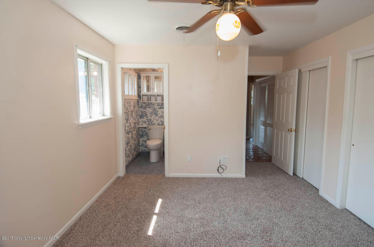 6016 Gainsborough Road Amarillo, TX 79106 - Photo 17 of 36 a view of empty room with window