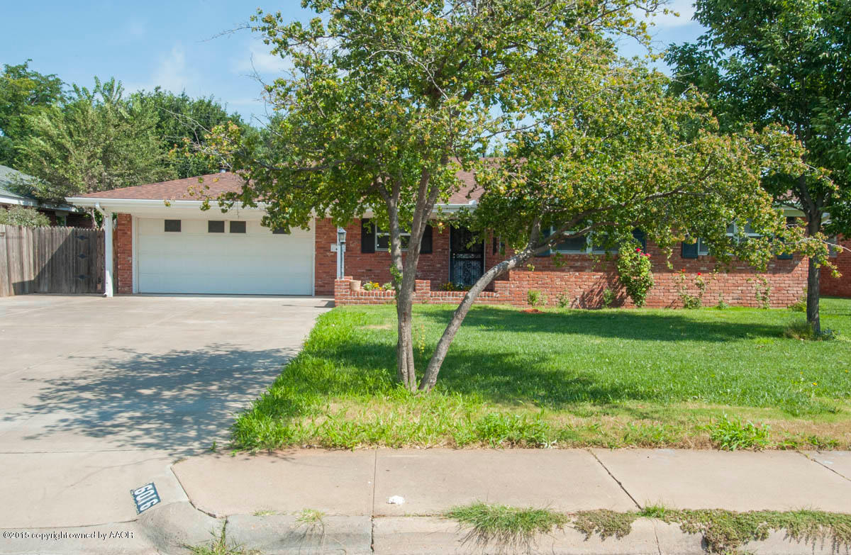 6016 Gainsborough Road Amarillo, TX 79106 - Photo 3 of 36 a front view of a house with a yard and a tree