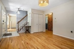 6 Mellen Street Hopedale, MA 01747 - Photo 13 of 42 a view of empty room with wooden floor and fan