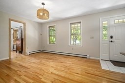 6 Mellen Street Hopedale, MA 01747 - Photo 16 of 42 a view of an empty room with wooden floor and a window