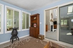 6 Mellen Street Hopedale, MA 01747 - Photo 18 of 42 a living room with furniture and windows