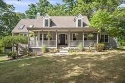 6 Mellen Street Hopedale, MA 01747 - Photo 2 of 42 a front view of a house with a garden