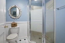 6 Mellen Street Hopedale, MA 01747 - Photo 33 of 42 a white toilet sitting next to a bathroom sink